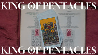 King of Pentacles tarot card on book background – weekly tarot reading for grounding, abundance, and stability