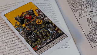 A close-up of the King of Pentacles Tarot Card from the Raider Waite Deck