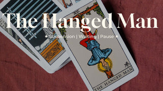 he Hanged Man tarot card symbolizing pause, surrender, and new perspective.
